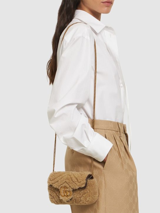 Luisaviaroma Borsa Super Mini GG Marmont in shearling Italia
