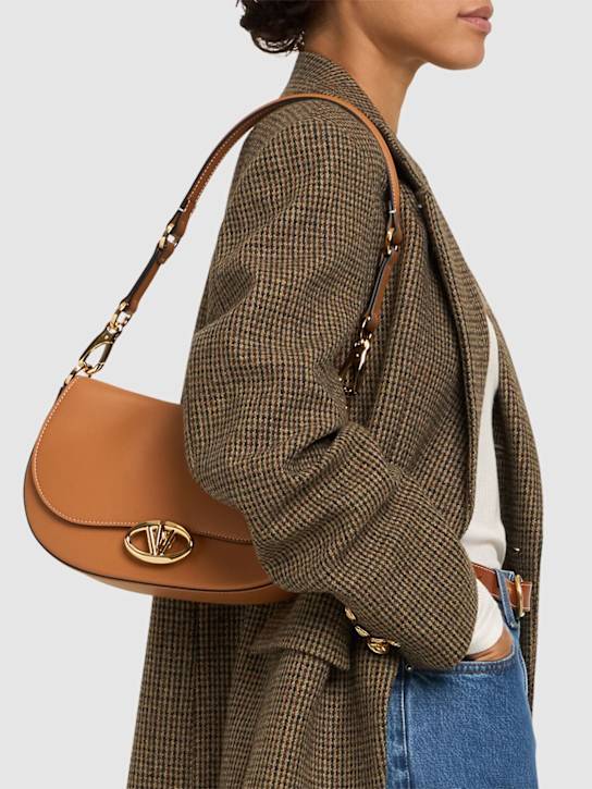 Luisaviaroma Borsa Saddle in pelle con logo In Vendita